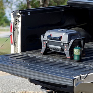 grill2go portable gas bbq cooking on ute
