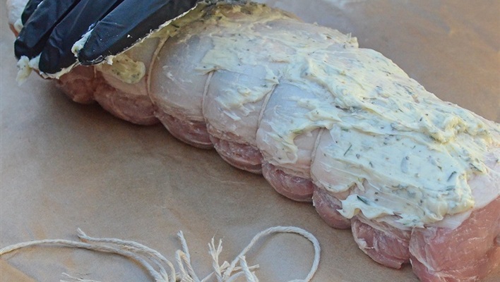 The butter doesn't have to be perfect, just get it smeared on there. It melts shortly into the cook anyway and then starts basting the meat as it spins.