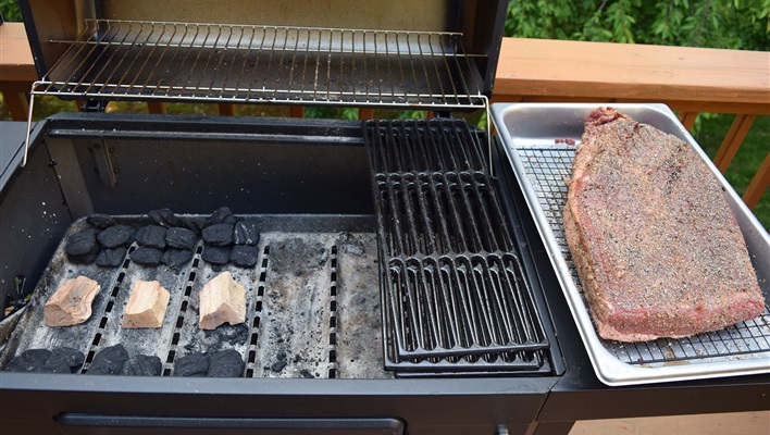 This is where live coals will be placed. The brisket will go on the right side, away from the direct heat.